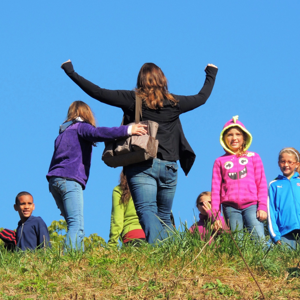 Teacher and students at the top of the Indian mound