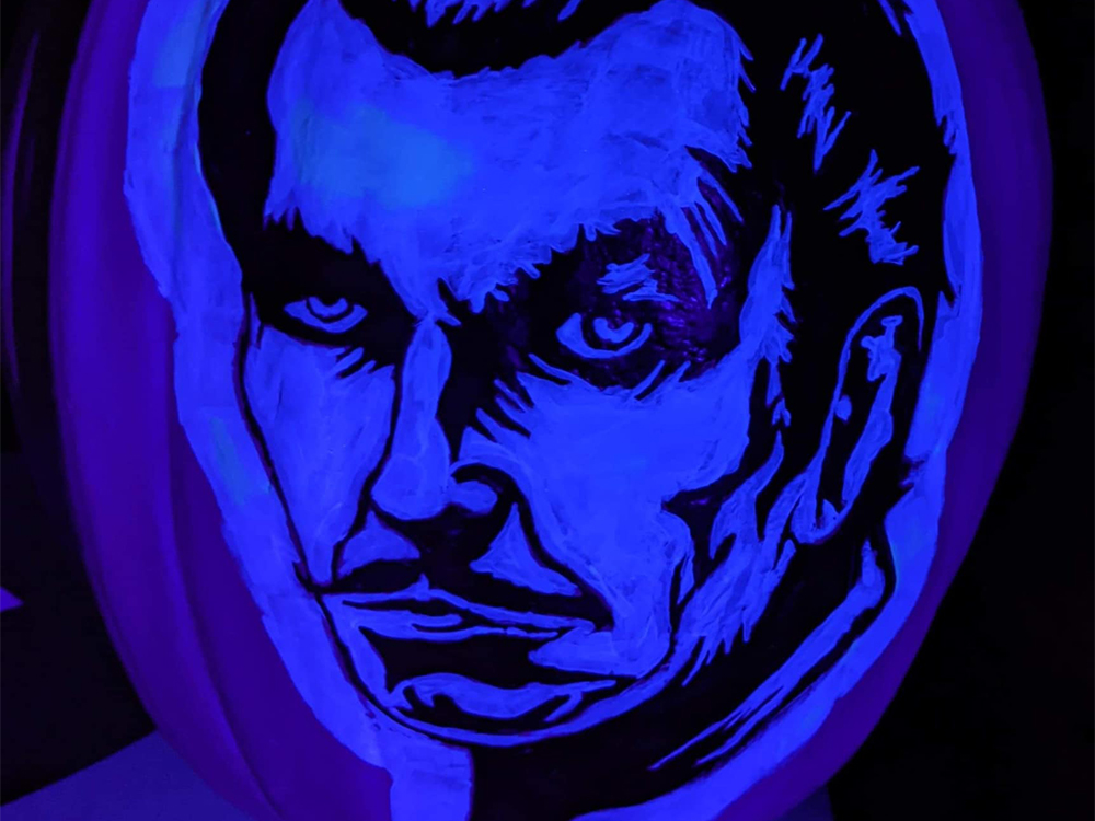 blacklight glowing pumpkin with vincent price